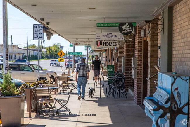 Downtown Taylor boasts a variety of shops around the square, a dog-friendly place for a stroll.