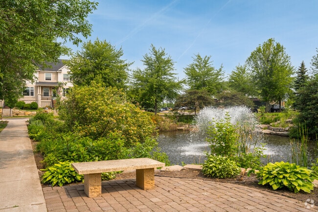 Victor Gardens has a park with fountains and park benches.