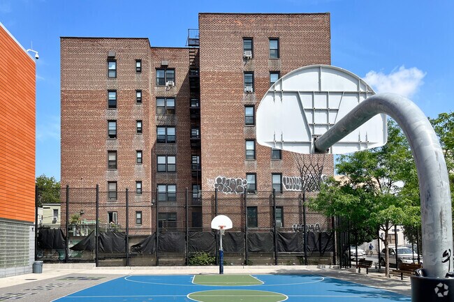 Students of PS 130 The Parkside have access to a basketball court in Brooklyn.