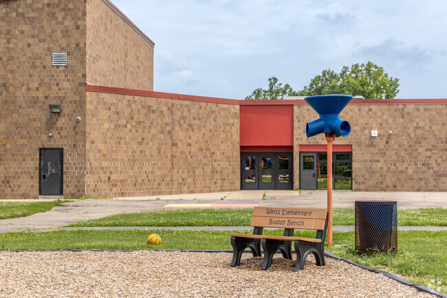 Frank E. Weiss Elementary School buddy bench on the playground in the city of Trenton.