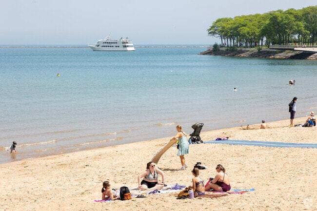 Mag Mile residents enjoy the pristine shoreline at Ohio St Beach all summer long.