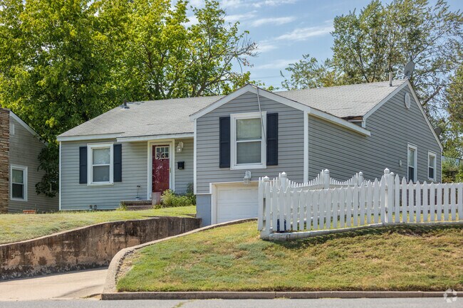 Discover cozy charm in a Sand Springs bungalow, where comfort and character unite.