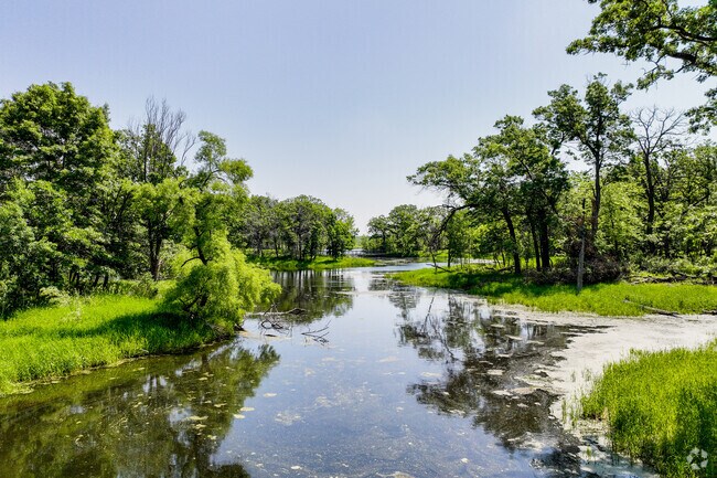 Acres of waterways and green spaces at Lake Elmo Park Reserve for hikers to walk along the lake.