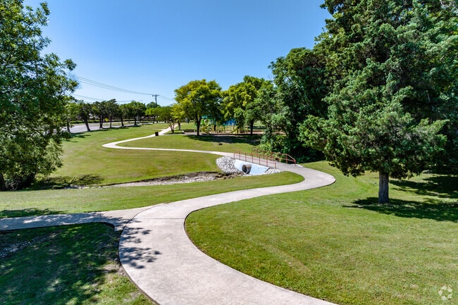 Stroll along the windy half mile path in Calf Pasture Park in Desoto.