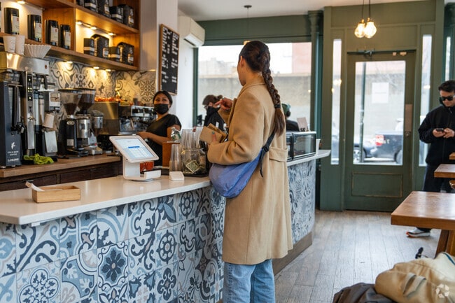 Carroll Garden's Brooklyn Habit has a beautiful patterned tile coffee bar.