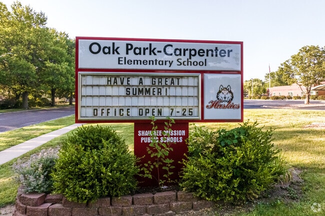 Oak Park-Carpenter Elementary School sign is adorned with their Huskies mascot.