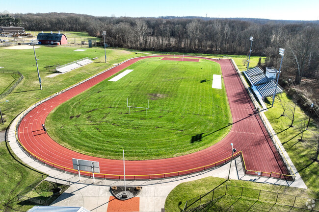 Play football for the Falcons at Burlington Township High School.