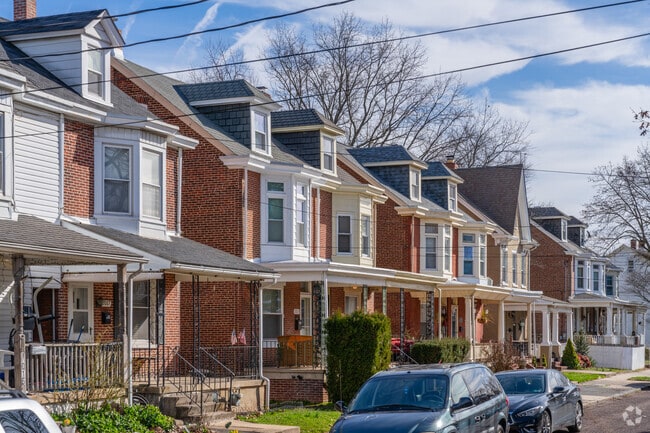 Two-story homes have bay and dormer windows with comfortable walking streets in East End South.