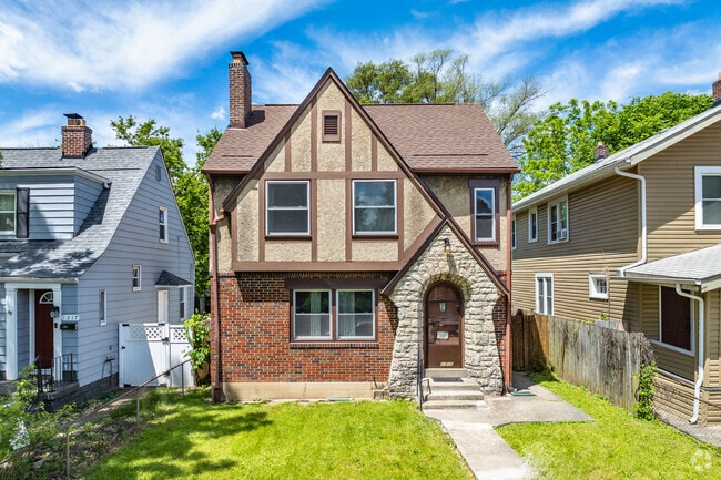 A Tudor style home in Karns Park features a well-manicured front lawn.
