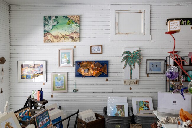 The Old Florida Outdoor Center and Gallery on Dearborn Street has artsy & eclectic pieces.