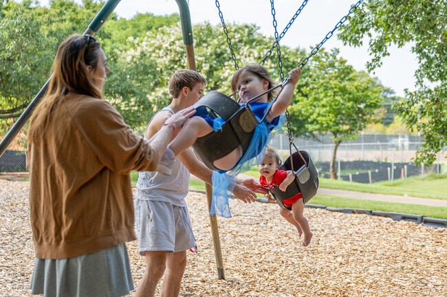 Take your kids to the playground at Bishop Park found near Forest Heights.