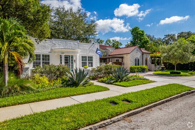Beautiful landscaping makes the streets of SoHo neighborhood look fresh & lively.