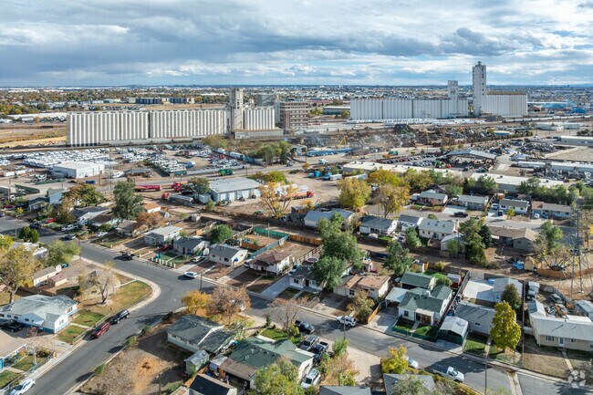 The industrial Ardent Mills tower over the Adams Heights neighborhood.