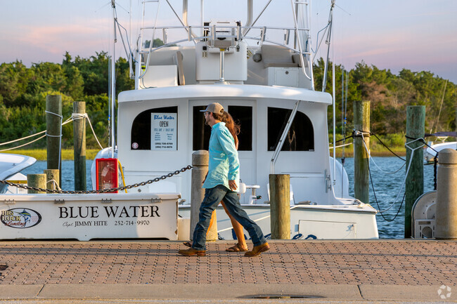 You can enjoy a walk along the many larger charter boats in downtown Morehead City.