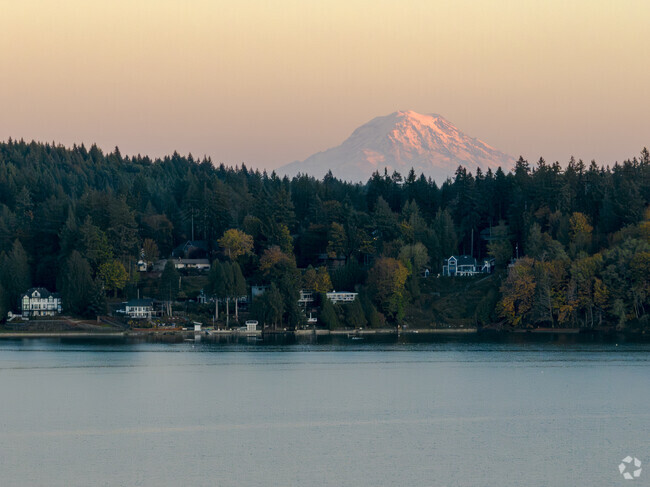 The majestic Mt Rainier glows as the sun sets over Wauna.