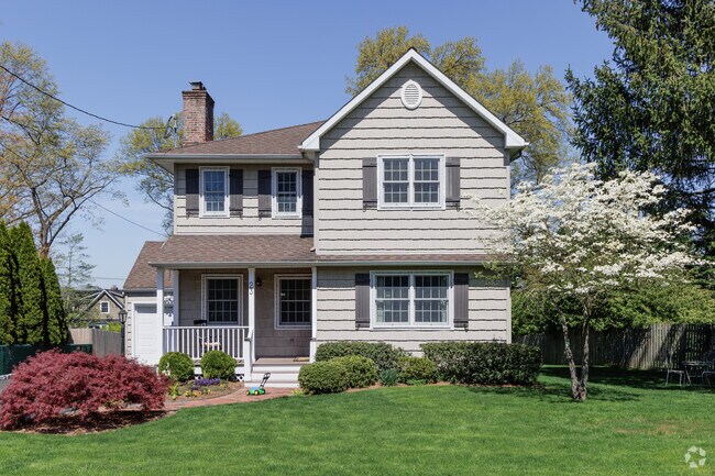 A colonial style home is the picture of suburban idyll in Madison, NJ.