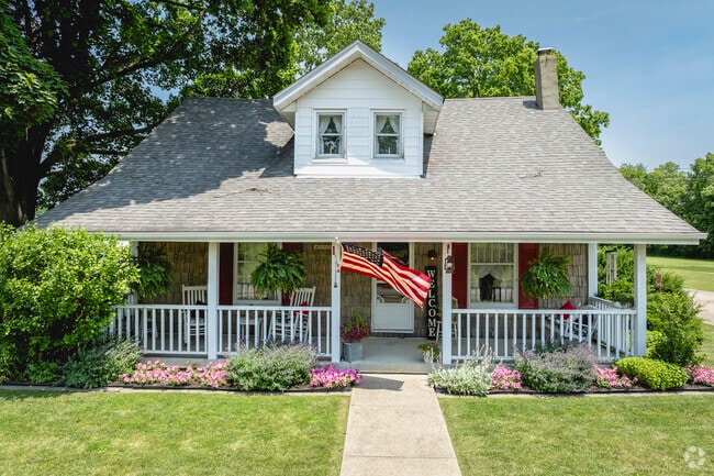 This Markleville home features a covered front porch to enjoy the outdoors rain or shine.