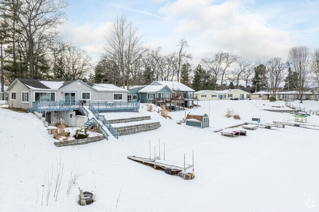 Twin Lake's lakefront homes come with their own private beaches and docks.