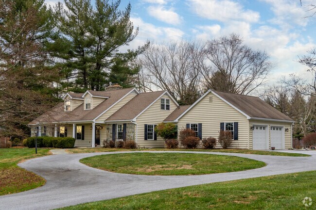 Larger homes near East Bradford's country clubs often include multi-car garages.