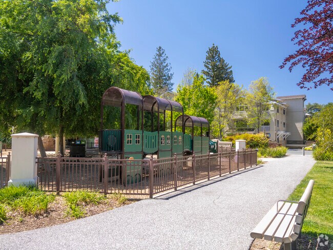 There is a playground in Heritage park located in the University South area.