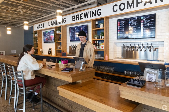 Mast Landing Brewing Company taproom pours local ales in Freeport, 7 miles away.