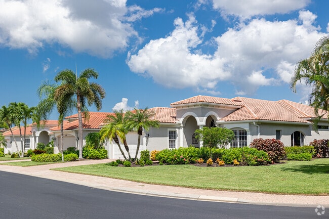 Most homes in Mediterra are built in a Mediterranean style with red tile roofs.