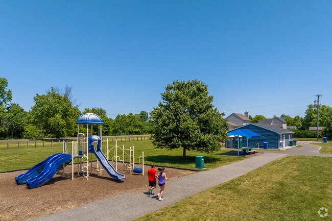 Locals jog along the trails running throughout the developments in Logan Township.
