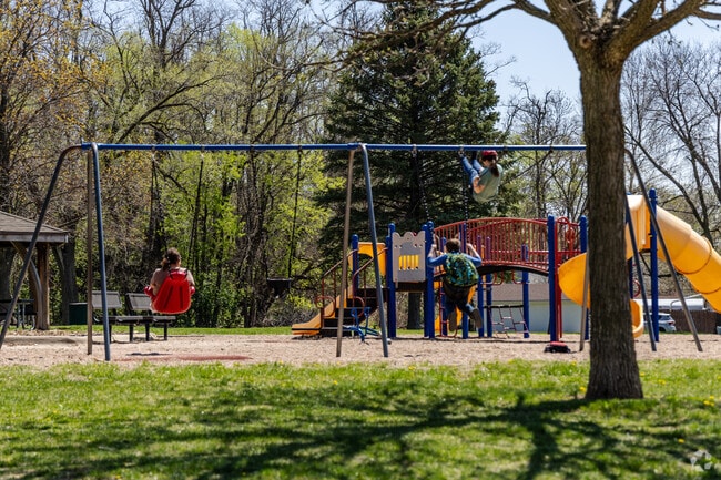 Kids of all ages love the swings at Sternhill Park in The Heights.