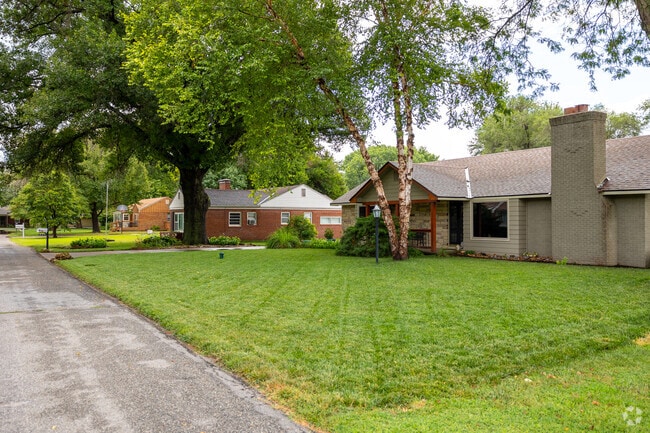 Yards with large lush trees make for shady living in North End Riverview.