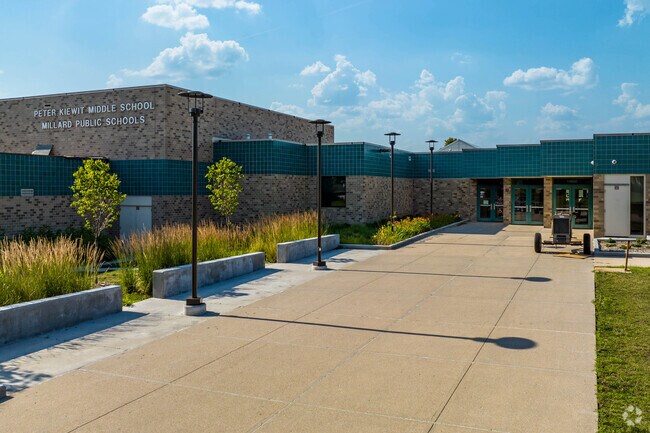 The architecture of Kiewit Middle School is modern and inviting.