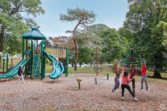 Kids in Salem have a blast at the adventurous playground at Forest River Park near Highland Avenue.
