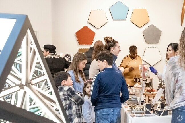 Long Beach families enjoy their Saturday at the Compound Community Market.