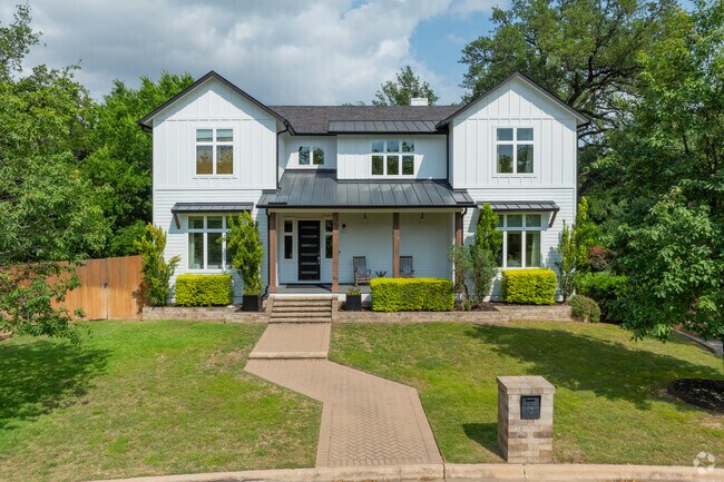 A gorgeous two story traditional home located in the green and scenic Manchaca.