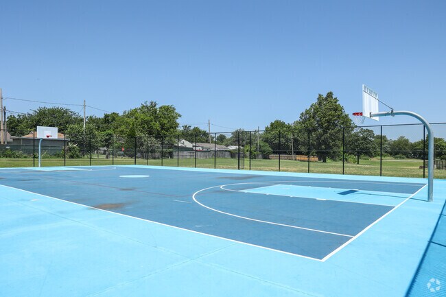 Clinton Park sits at the center of North Evanston Place and has basketball courts available.