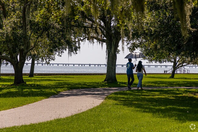 The lakefront in Mandeville is a perfect place to take a leisurely walk and enjoy the sunshine over Lake Pontchartrain.