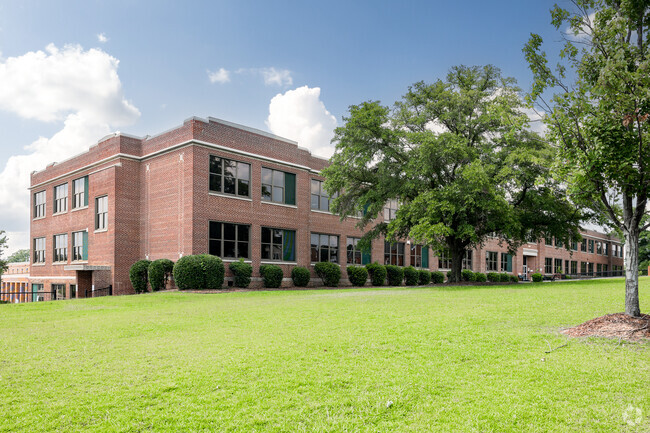 C. A. Johnson High School has beautiful brick classroom buildings.