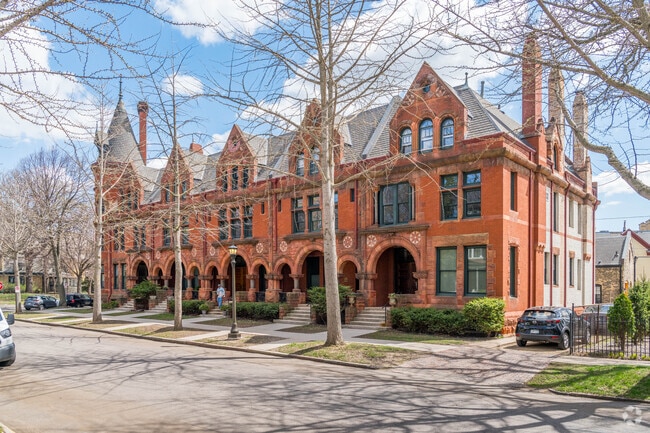 Several historic brownstone condominiums like this one can be found in Summit-University.