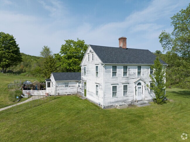 A classic colonial with a lovely whitewash.