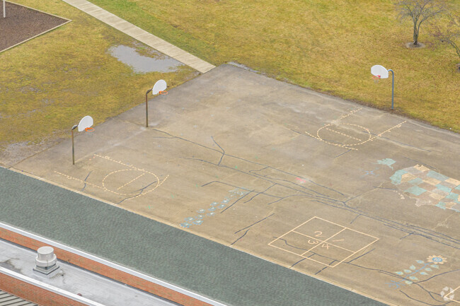 Challenge your friends to a game of basketball at  White Eagle Elementary School's court.