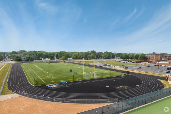 John F Kennedy High School has a running track.