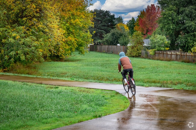 Bikers can take the Fern Ridge Trail to ride along The Amazon Creek in West Eugene.