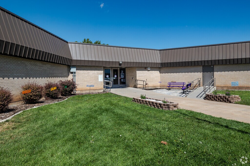 Riverdale Elementary School has a vibrant green lawn for students to enjoy.