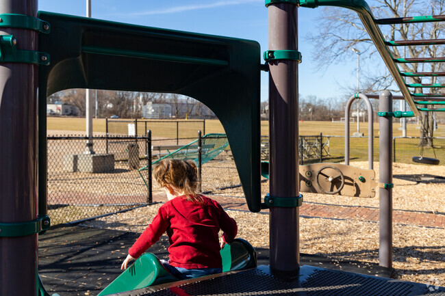 Enjoy the playground or the ballfields at Barnes Memorial Park near The Manor.