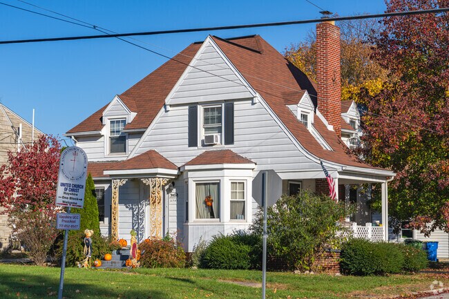 A lovely Tudor revival home in Emigsville with beautiful landscaping.