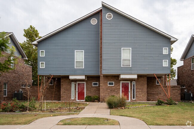On one side of John F Kennedy is a group of duplex homes part of the fair housing.