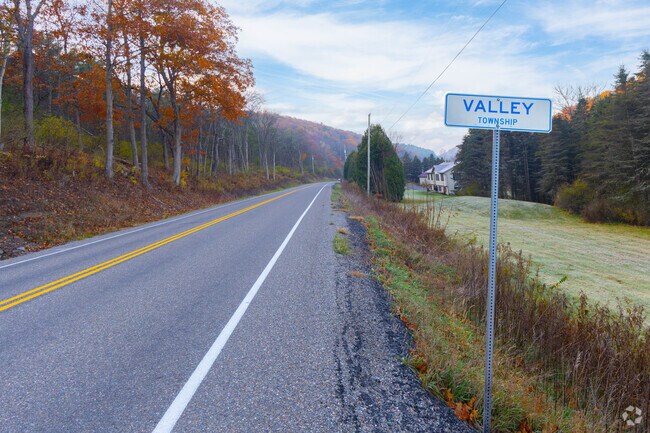 Country roads in Valley connect small subdivisions and open fields.