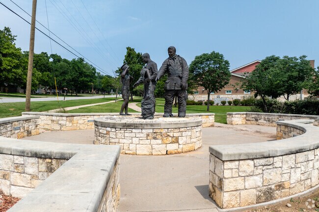A heartfelt tribute in Azle, near Pelican Bay, celebrates community heroes.