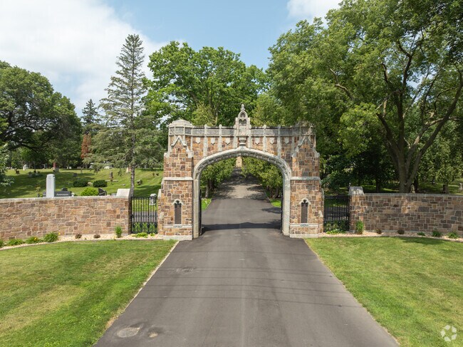 Eastside's Oakwood Cemetery has tall stone gates, which guard 30 acres of landscaped plots.