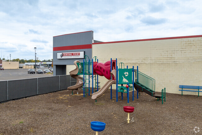 Central Point Preparatory Academy in Outer Greater Hilltop features a playground for children.