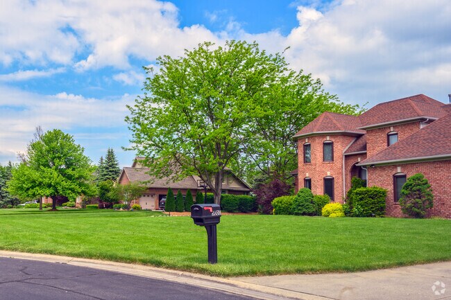 Larger, newer homes, surround the Travis Pointe golf course.